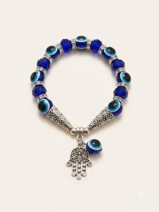 Handmade blue evil eye Hamsa hand bracelet with crystal beads and silver charm pendant.