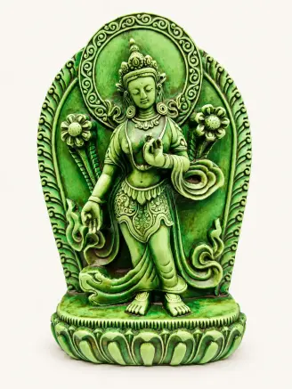 Green Tara Buddhist resin statue with intricate ornamental detailing and green finish