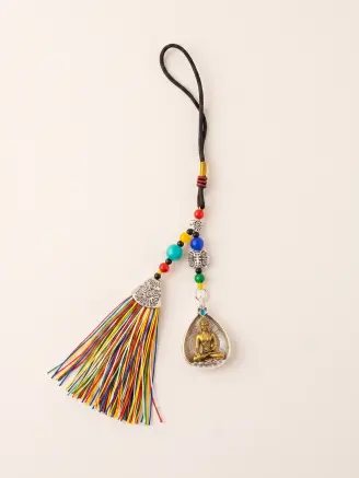 Handmade meditating Buddha hanging charm with multicolor tassel and decorative beads